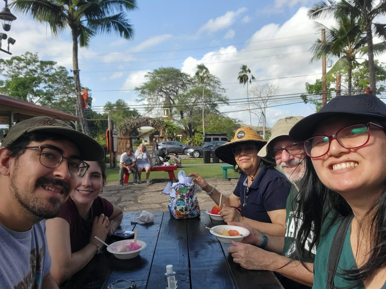Jessie and Paul's family eating shave ice