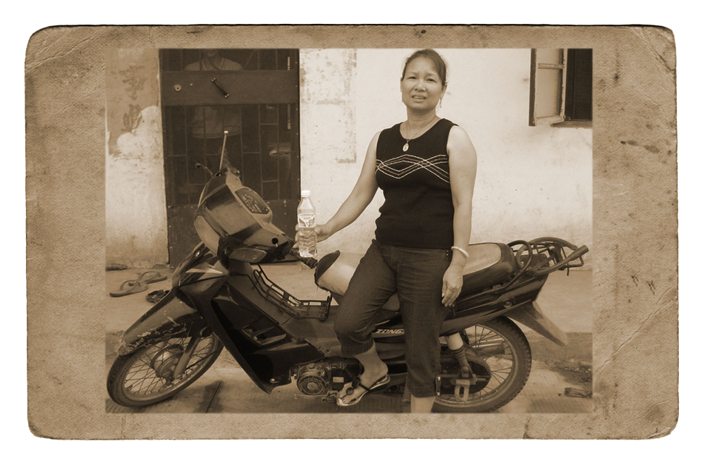 mom posing with a moped